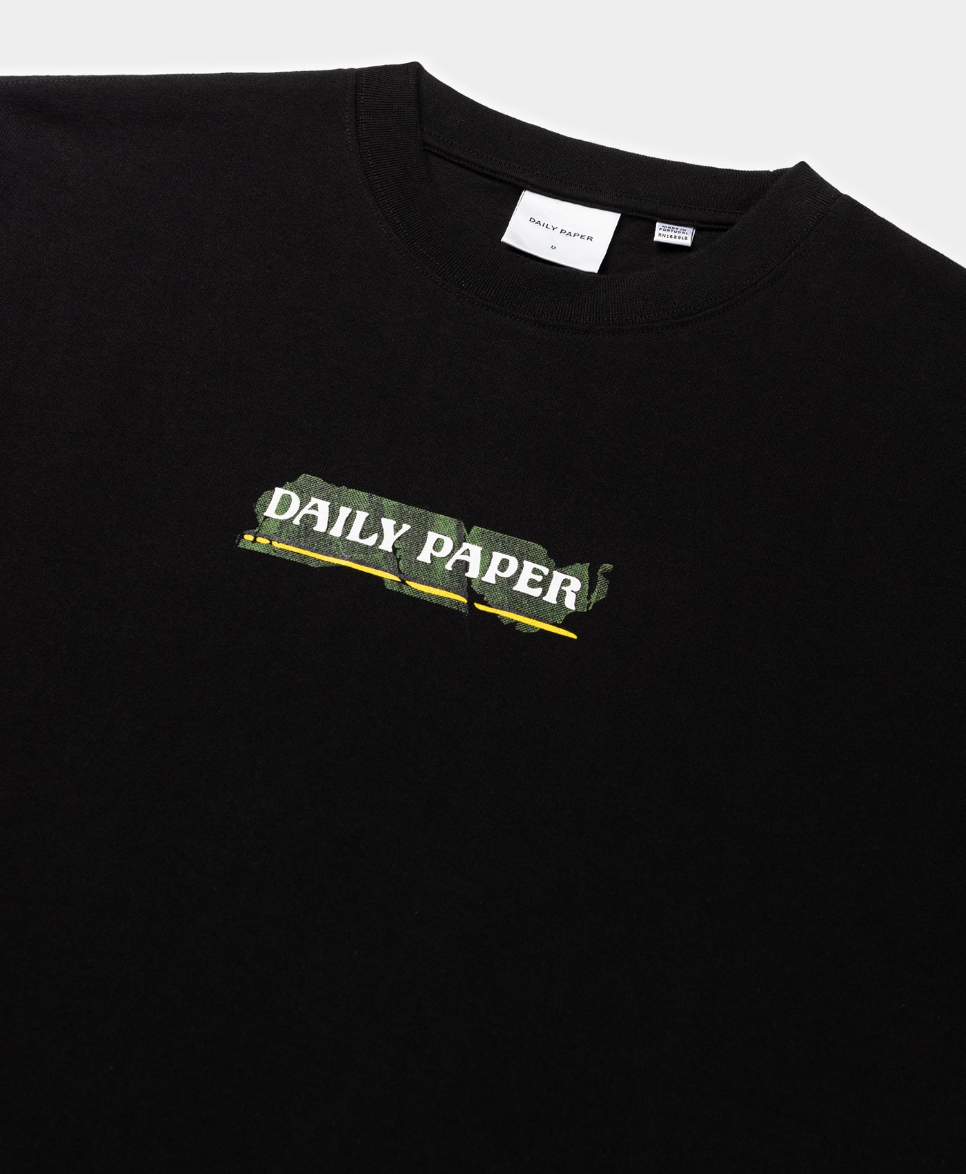 DP - Black Sticker T-Shirt - Packshot - detail